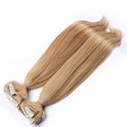Brasileiro grampeado em linha reta no louro dourado das extensões do cabelo para a mulher